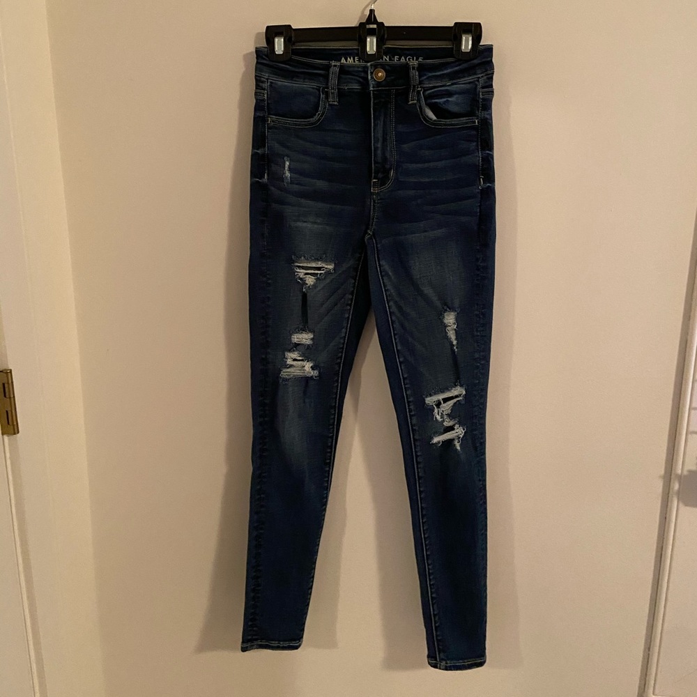 American Eagle super stretch blue jeans with holes